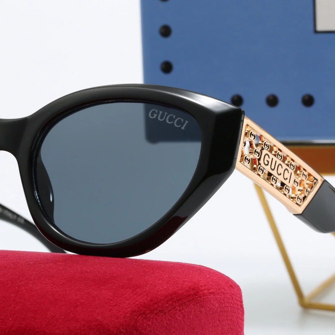 Small frame triangular cat-eye sunglasses